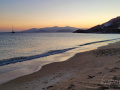 Severný okraj pláže Agios Prokopios po západe slnka
