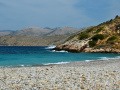leží v zálive medzi plážami Didima a Agia Irini na západe Chiosu.