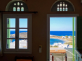 Tinos - pohľad na pláž Agios Ioannis zo štúdia Kyklades